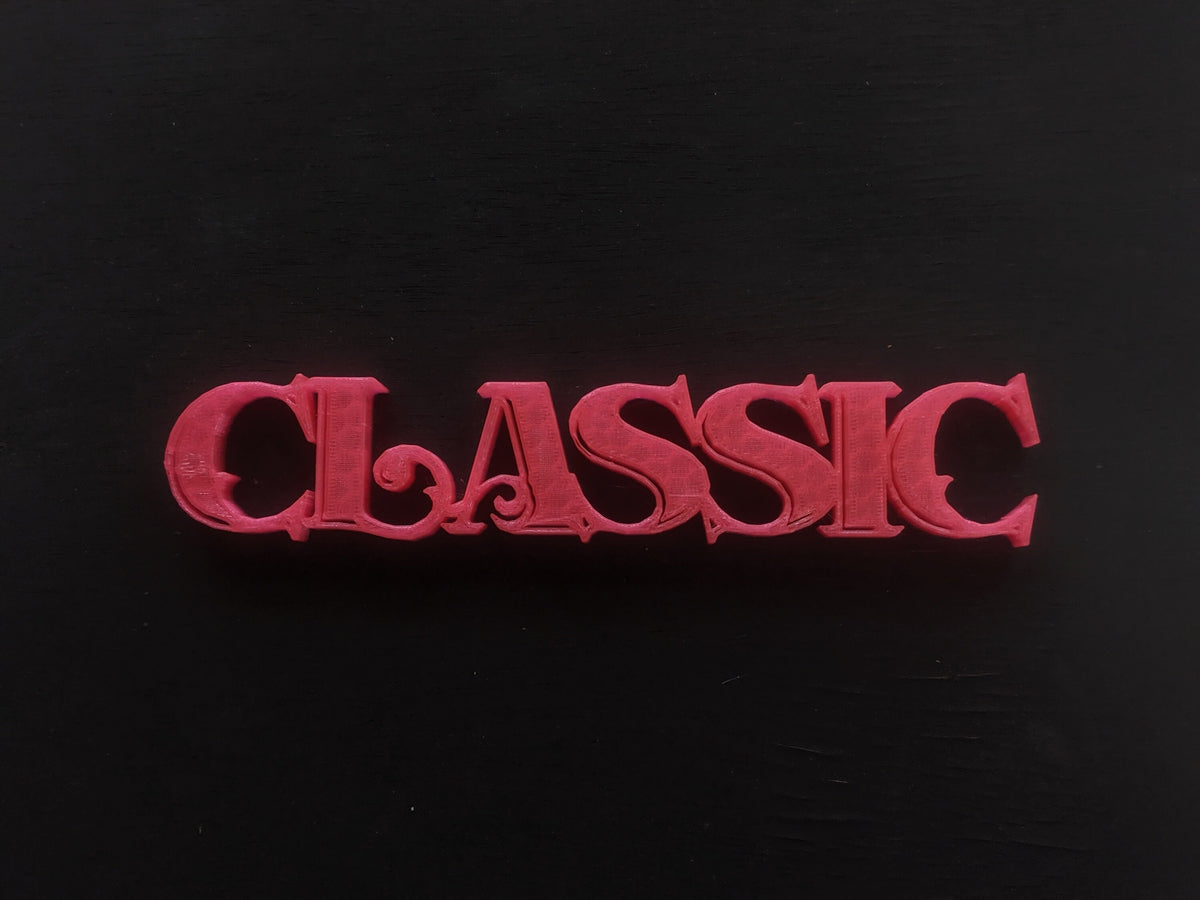 Colorful 3D-printed movie genre sign set on a black background — image 7 of 10