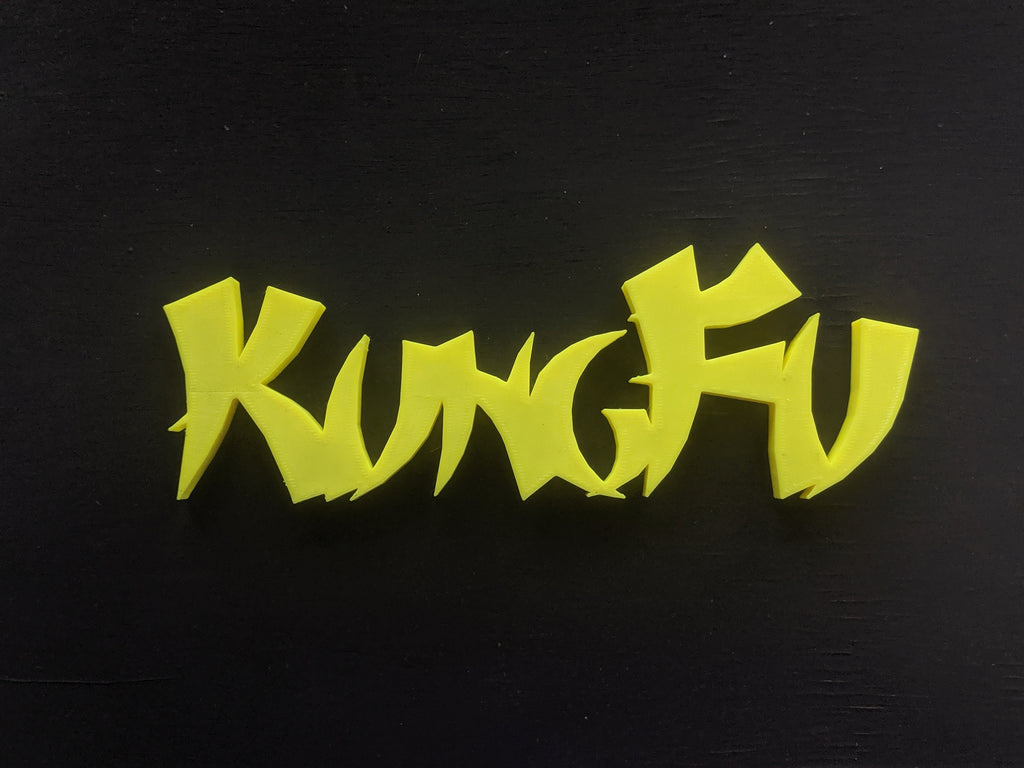 Colorful 3D-printed movie genre sign set on a black background — image 9 of 10