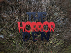 Layered red and black Horror Den 3D-printed sign — image 5 of 5