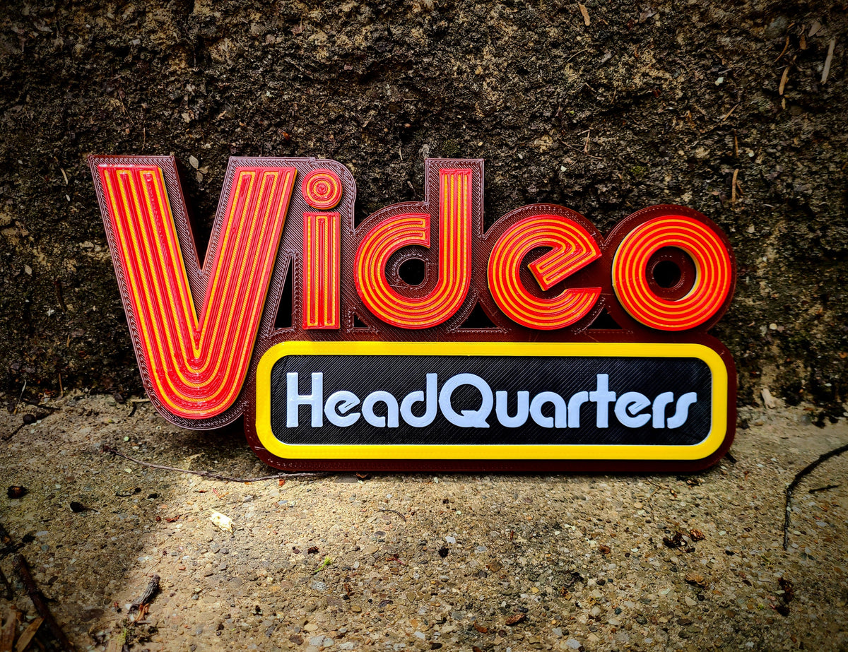 Red yellow and black Video Headquarters retro media-room sign — image 1 of 7