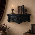 Ornate black Gothic wall shelf with baroque scrollwork — image 1 of 3