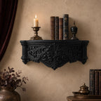 Ornate black Gothic wall shelf with baroque scrollwork — image 1 of 3