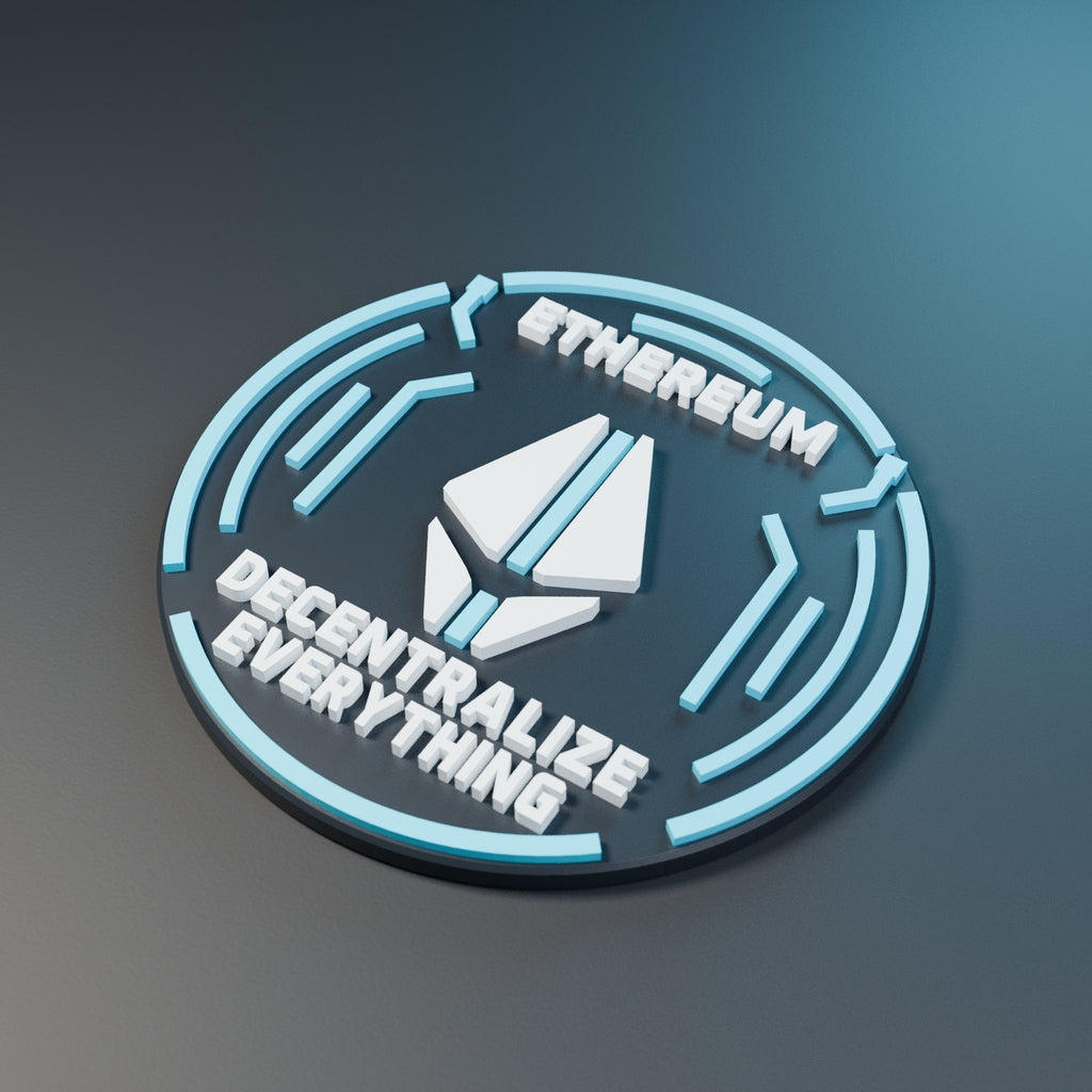 Angled render of the Ethereum Orbit medallion showing a thick dark edge, cyan circuit pattern and raised white lettering.