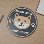 Computer-generated hero render of Much Wow medallion with rounded Shiba-inspired face and paws; charcoal, tan and white.