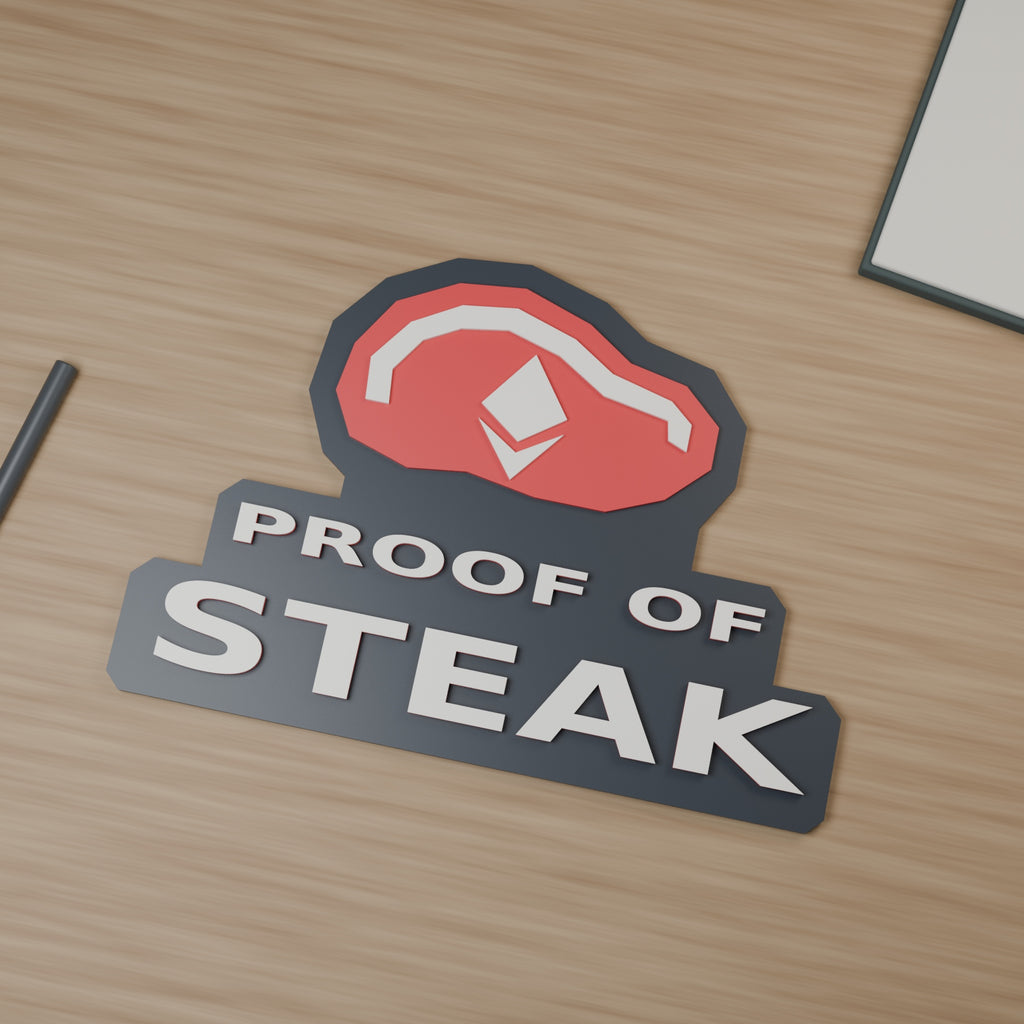 Computer-generated Proof of Steak sign on a wood-grain desk, with a red steak, white diamond emblem and raised letters.