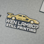Computer-generated closer render of the WEN LAMBO? STILL PRINTING sign showing a yellow car and layered white lettering.