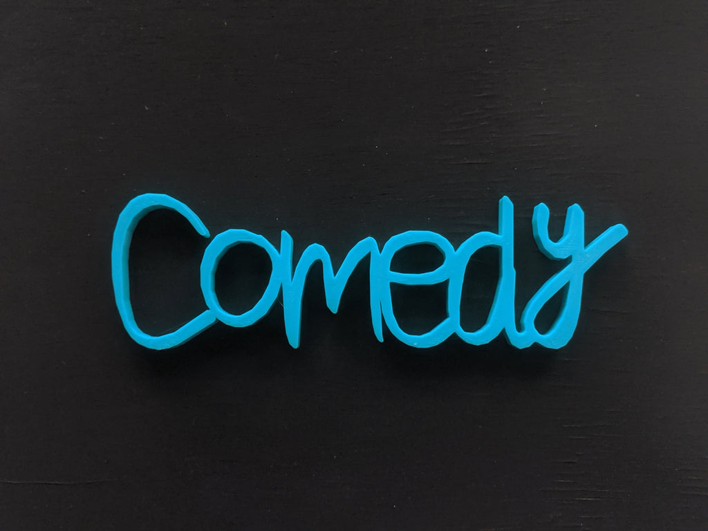 Colorful 3D-printed movie genre sign set on a black background — image 10 of 10